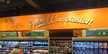 Whole Foods Corporation, Atten: John Mackey, Founder and CEO: Put "Compassion for Animals" signs on Vegan Product Shelves, Not Meat!